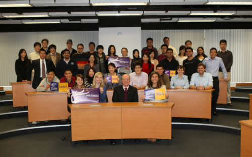 Michael J. Ferguson, Associate Dean and Director, MBA Programmes with MBA students celebrating CUHK ranking 28th in the Financial Times 2012 global full-time MBA rankings